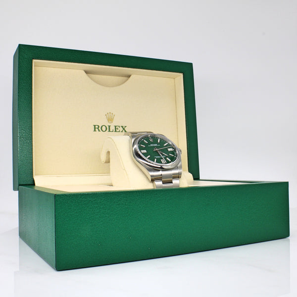 Rolex' Oyster Perpetual Green Face Watch | 8