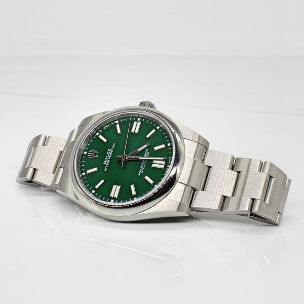 Rolex' Oyster Perpetual Green Face Watch | 8